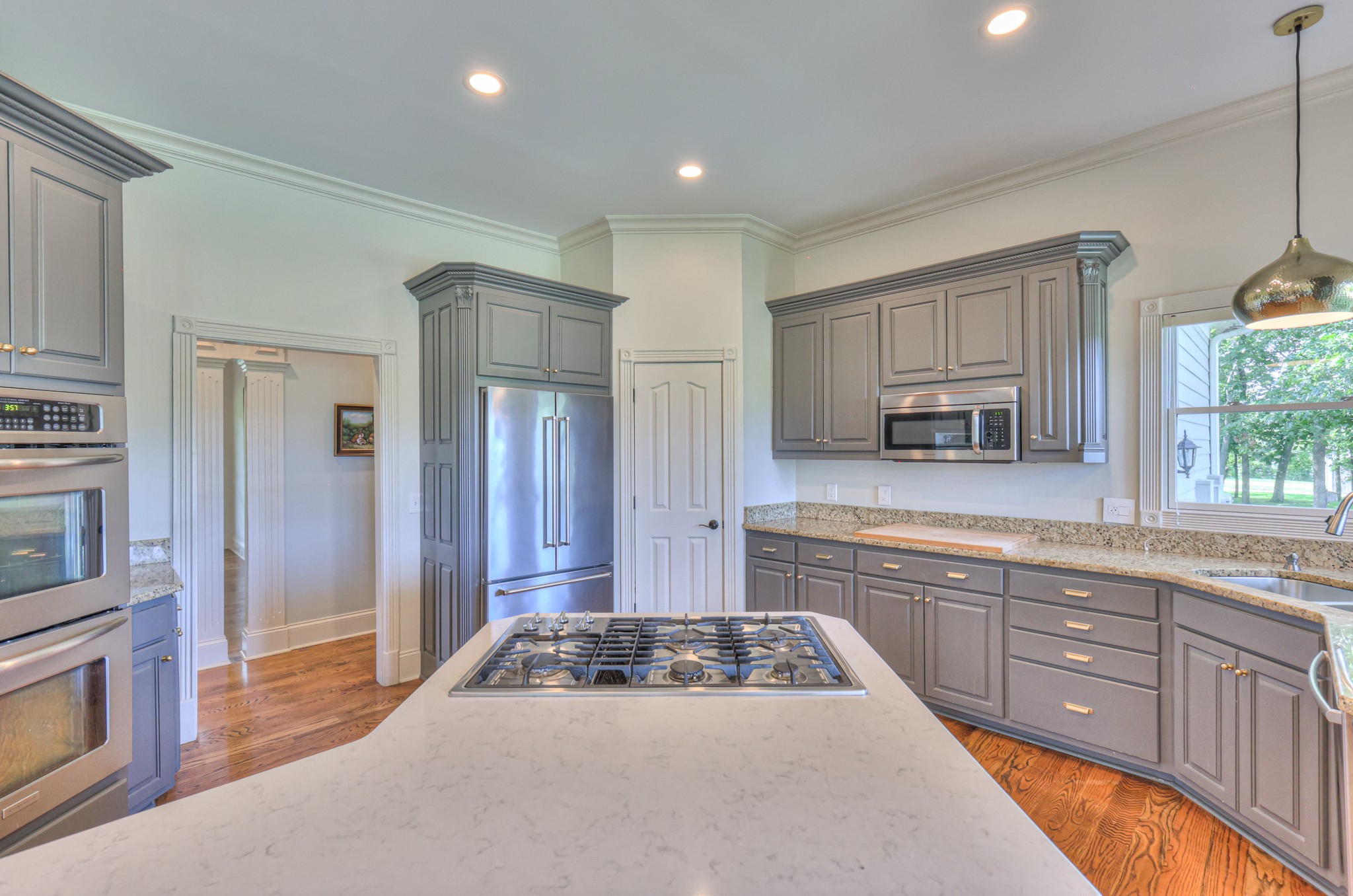 4288 Central Valley Road Murfreesboro, TN 37129 - Photo 27 of 77 a kitchen with stainless steel appliances granite countertop a stove a sink and a refrigerator