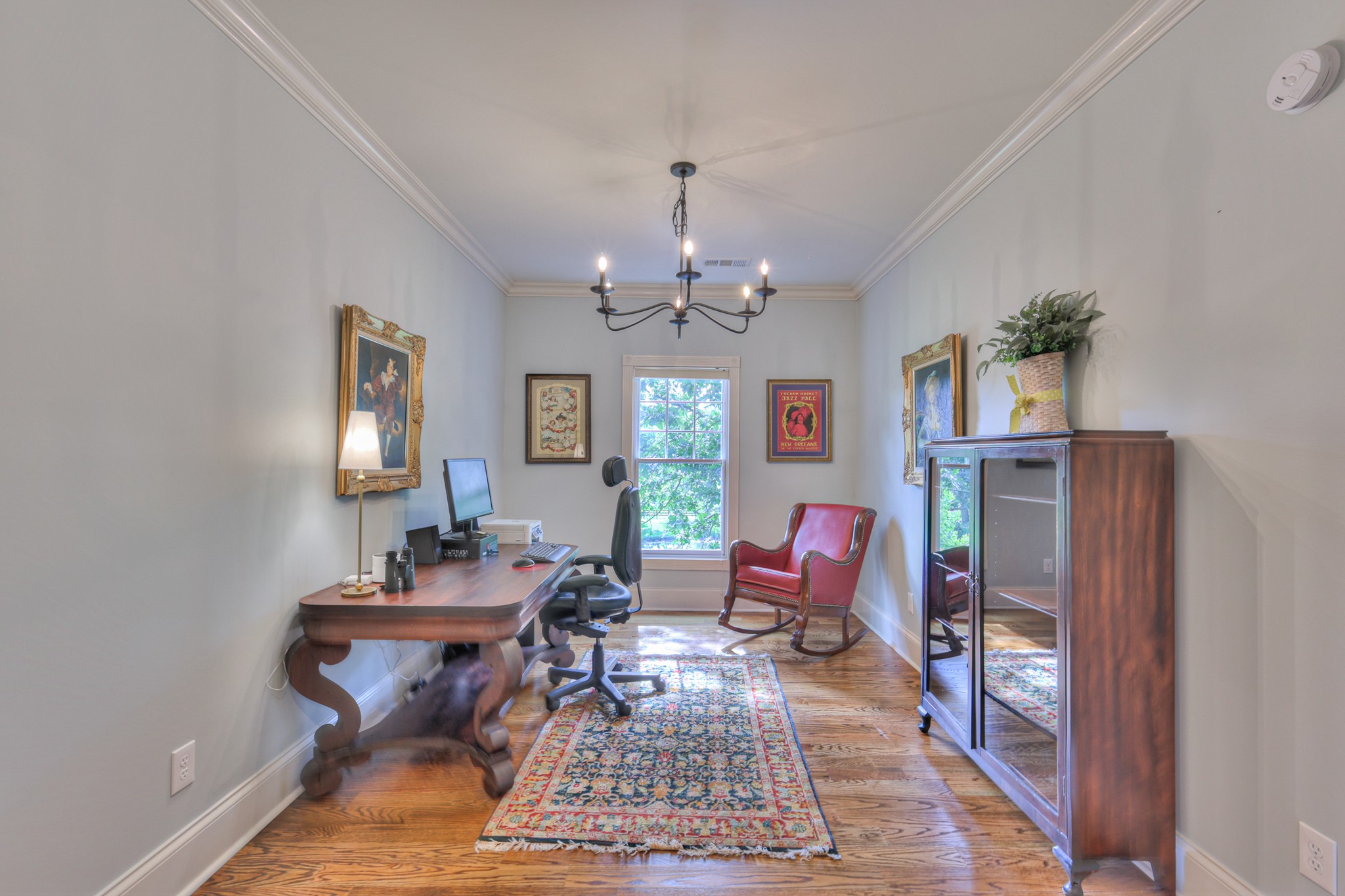 4288 Central Valley Road Murfreesboro, TN 37129 - Photo 54 of 77 a living room with furniture a rug and a chandelier