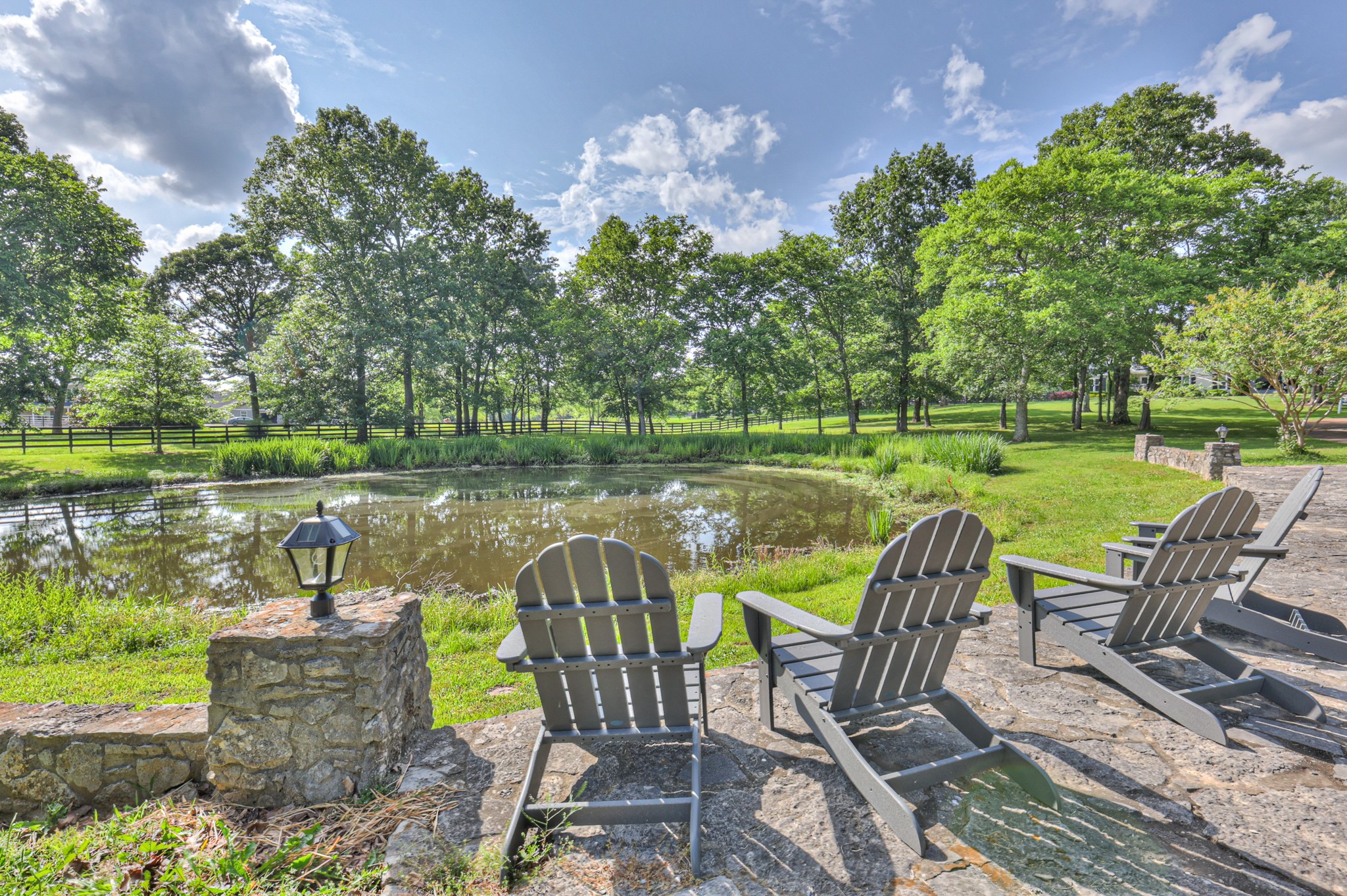 4288 Central Valley Road Murfreesboro, TN 37129 - Photo 72 of 77 a view of a lake with table and chairs