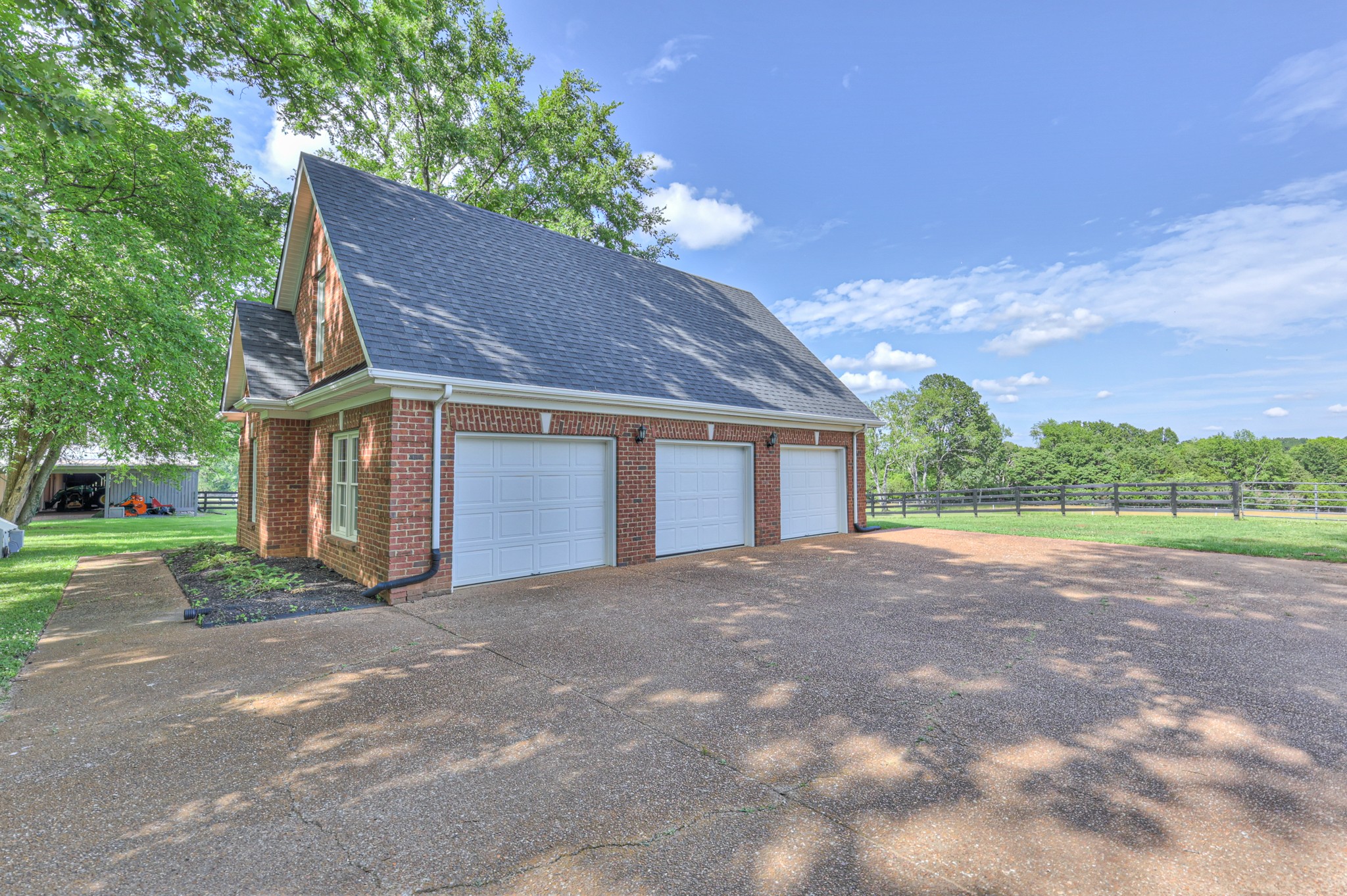 4288 Central Valley Road Murfreesboro, TN 37129 - Photo 77 of 77 a view of a house with a yard and garage