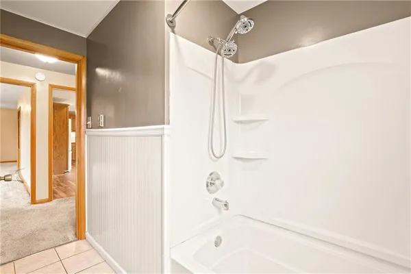 a bathroom with a sink and a shower