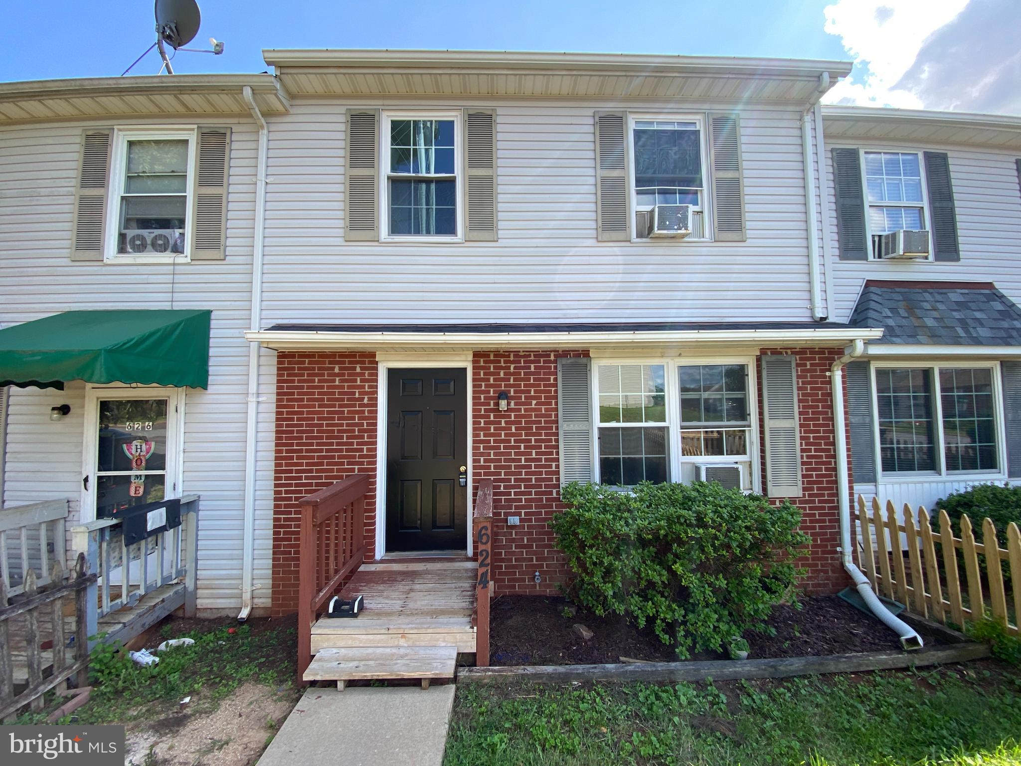 624 Highview Court Culpeper, VA 22701 - Photo 3 of 21 a front view of a house with a yard