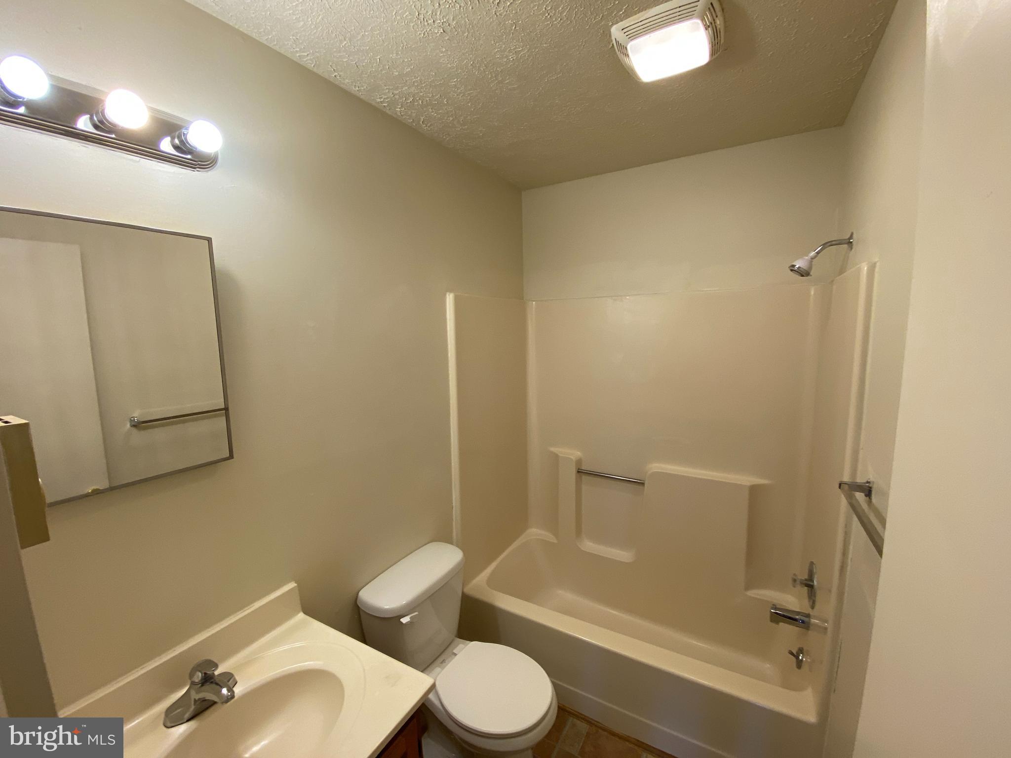 624 Highview Court Culpeper, VA 22701 - Photo 10 of 21 a bathroom with a sink toilet and shower