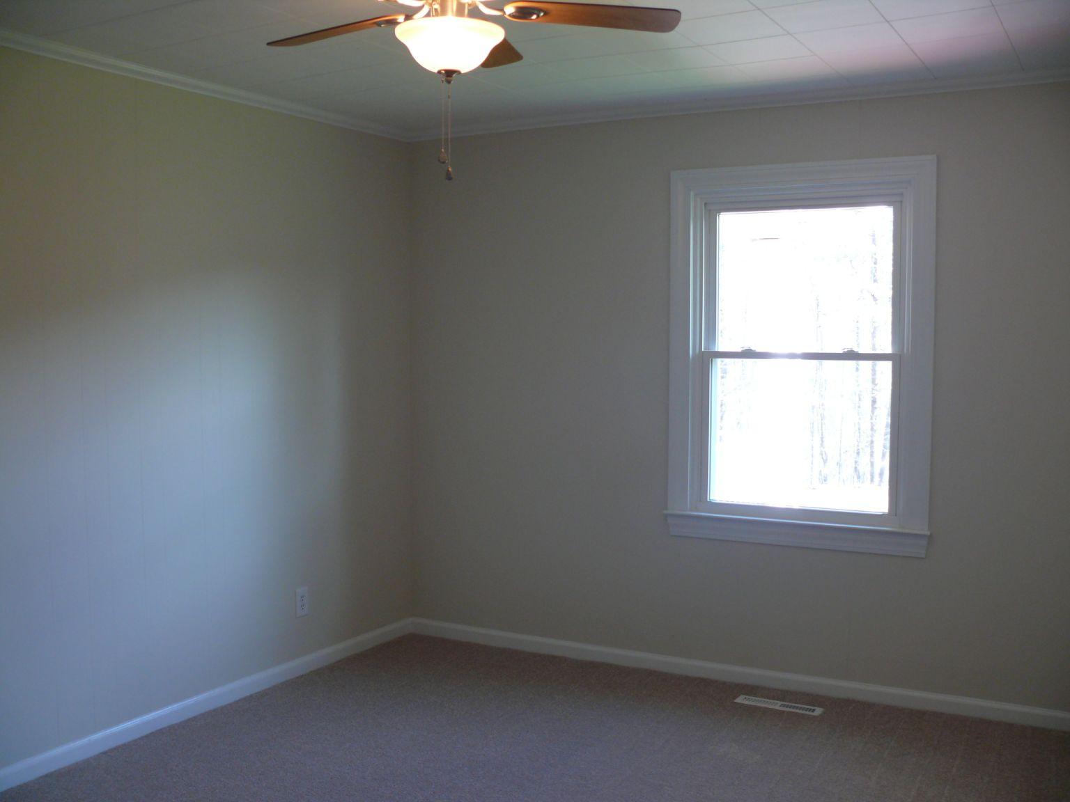 409 Republican Church Road Ferrum, VA 24088 - Photo 13 of 28 an empty room with a window