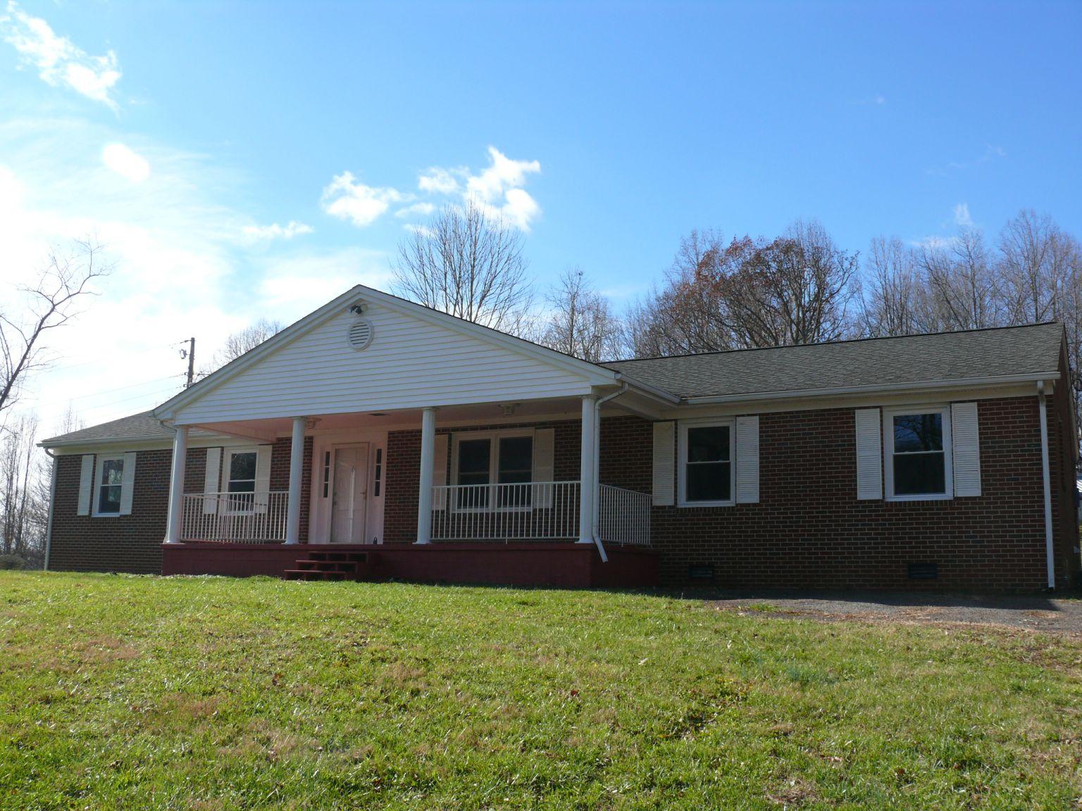 409 Republican Church Road Ferrum, VA 24088 - Photo 28 of 28 a view of a house with yard and tree s
