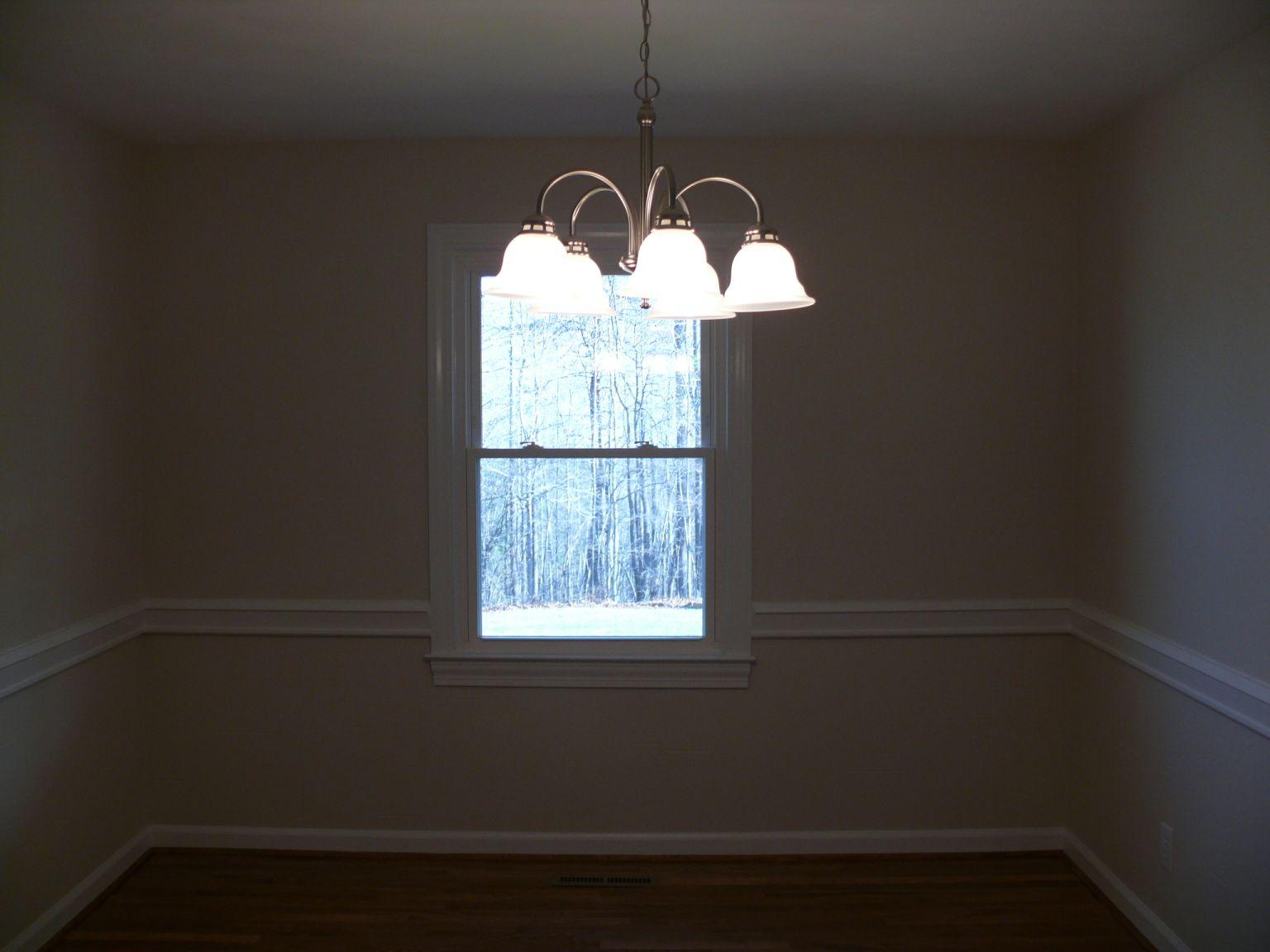 409 Republican Church Road Ferrum, VA 24088 - Photo 6 of 28 a room that has a window and a chandelier
