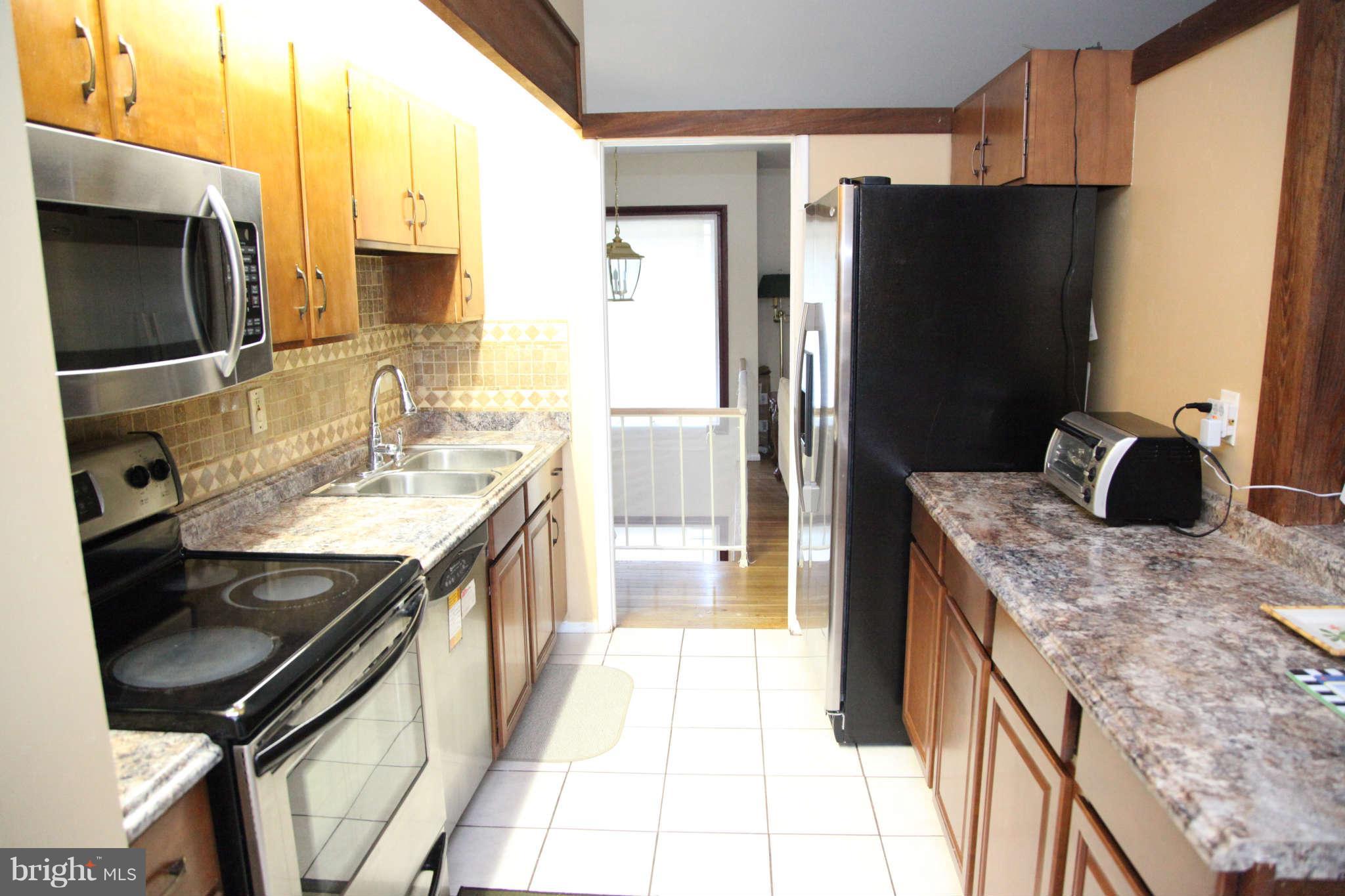 8614 Kiama Road Laurel, MD 20708 - Photo 11 of 30 Kitchen