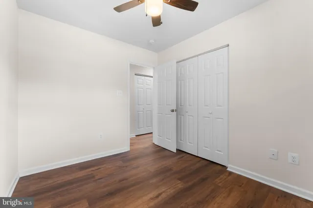 front view of a house with a chairs