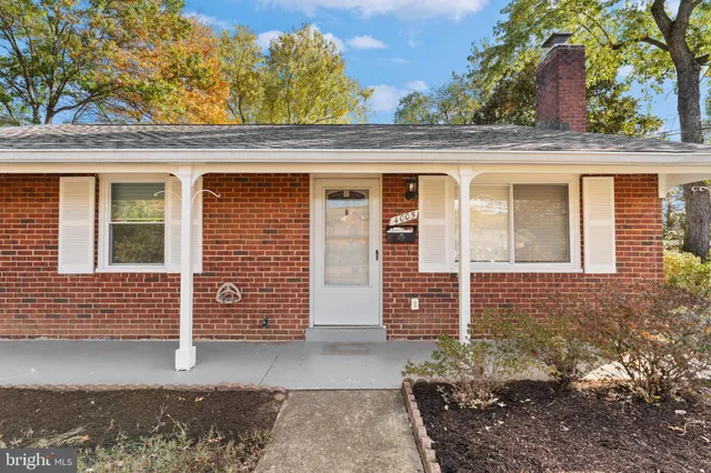 a view of a street with a building in the background