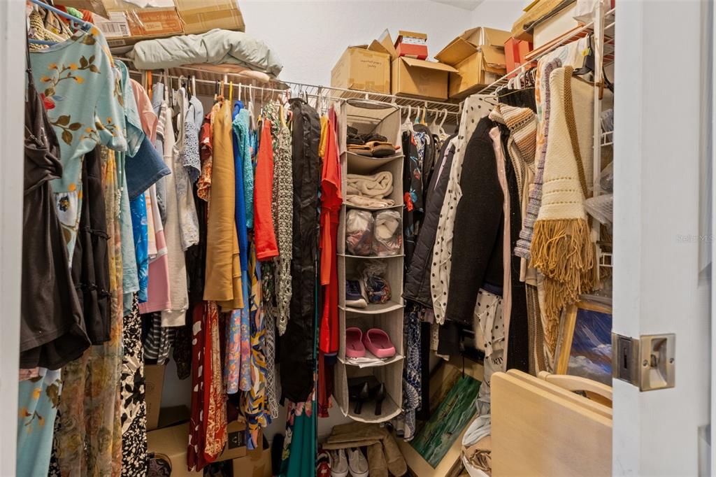 3493 East Odier Street Inverness, FL 34453 - Photo 17 of 24 a view of walk in closet with clothes