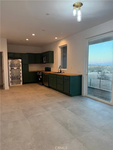 a bathroom with a sink a mirror and a shower
