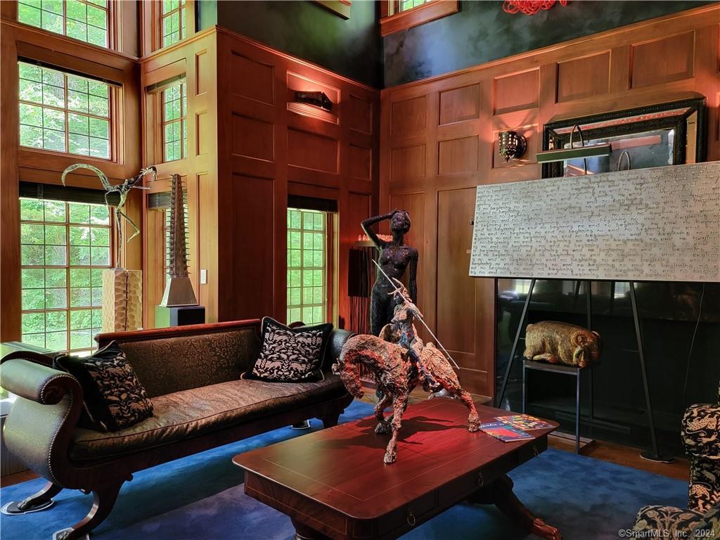 22 Ketcham Road Ridgefield, CT 06877 - Photo 13 of 40 a living room with furniture a window and a fireplace