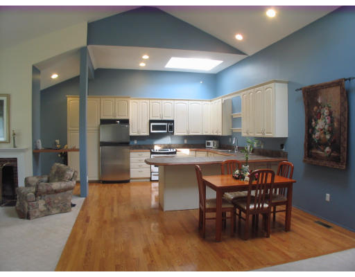238 Cordaville Road Ashland, MA 01721 - Photo 2 of 13 a large kitchen with a table and chairs