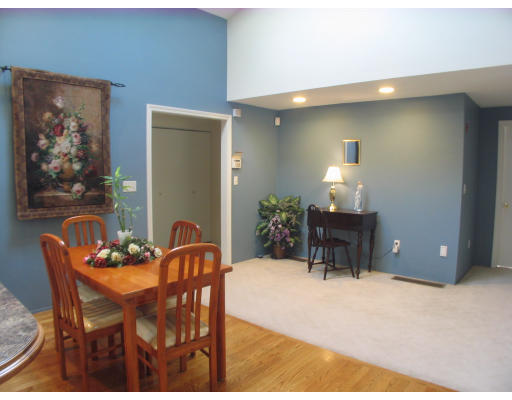 238 Cordaville Road Ashland, MA 01721 - Photo 4 of 13 a dining room with furniture and a potted plant
