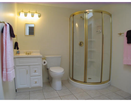 238 Cordaville Road Ashland, MA 01721 - Photo 8 of 13 a bathroom with a granite countertop sink toilet and shower