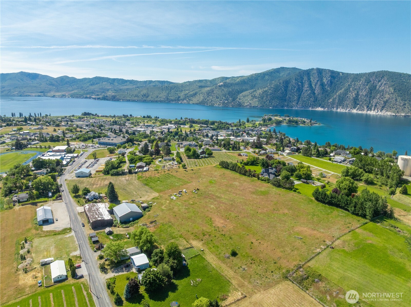 1281 Totem Pole Road Manson, WA 98831 - Photo 33 of 39 a view of a city with a lake