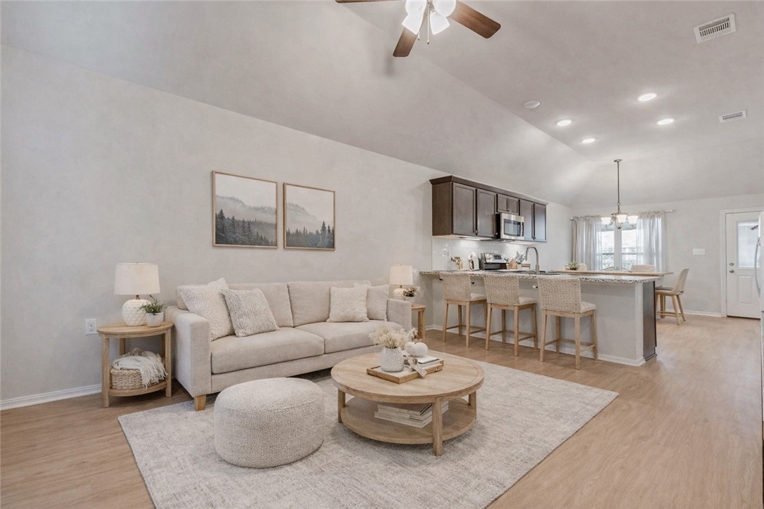 2855 Messenger Way Bryan, TX 77803 - Photo 5 of 16 a living room with furniture and a wooden floor