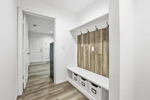 a view of a bathroom with closet area