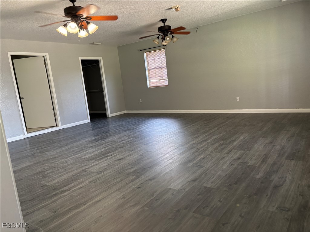 200 Ridgewood Avenue Clewiston, FL 33440 - Photo 16 of 50 wooden floor in an empty room with a window
