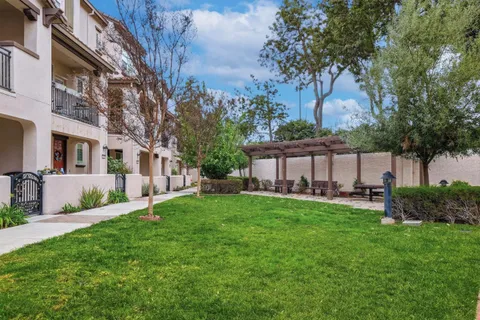 a front view of a building with a road