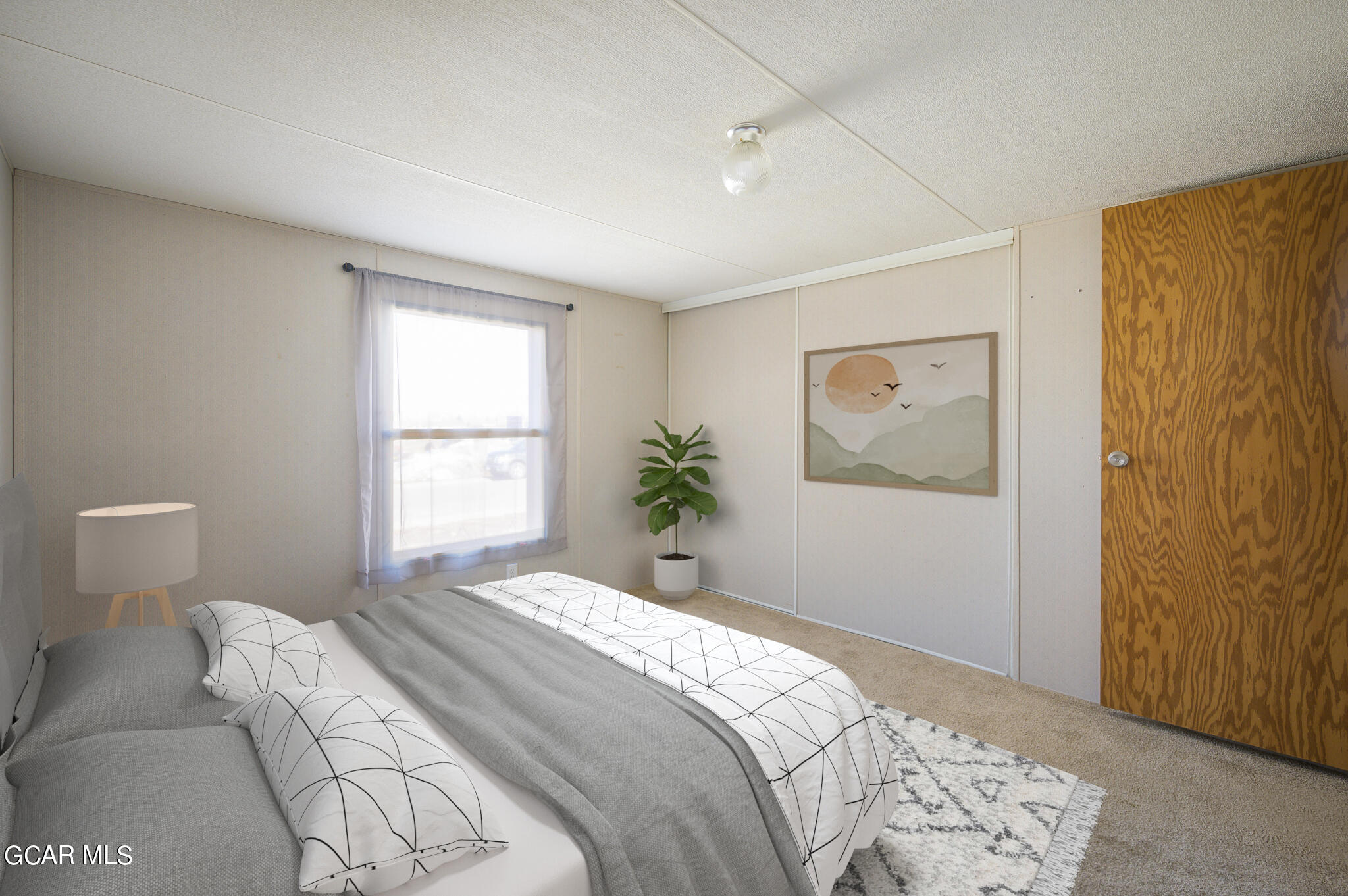 430 Casa Drive Granby, CO 80446 - Photo 17 of 37 a bedroom with a bed and a window