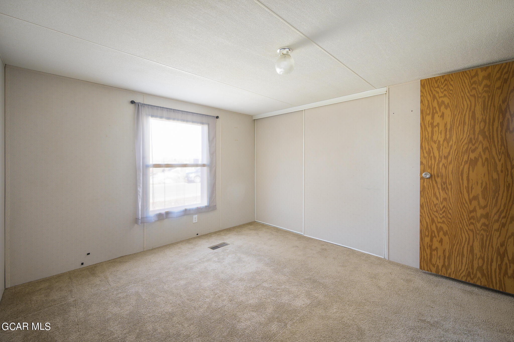430 Casa Drive Granby, CO 80446 - Photo 18 of 37 an empty room with a window