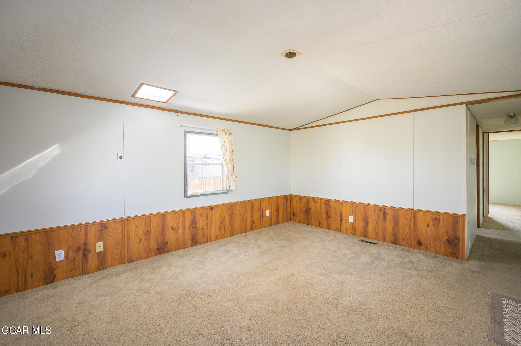 430 Casa Drive Granby, CO 80446 - Photo 2 of 37 a view of an empty room with a window