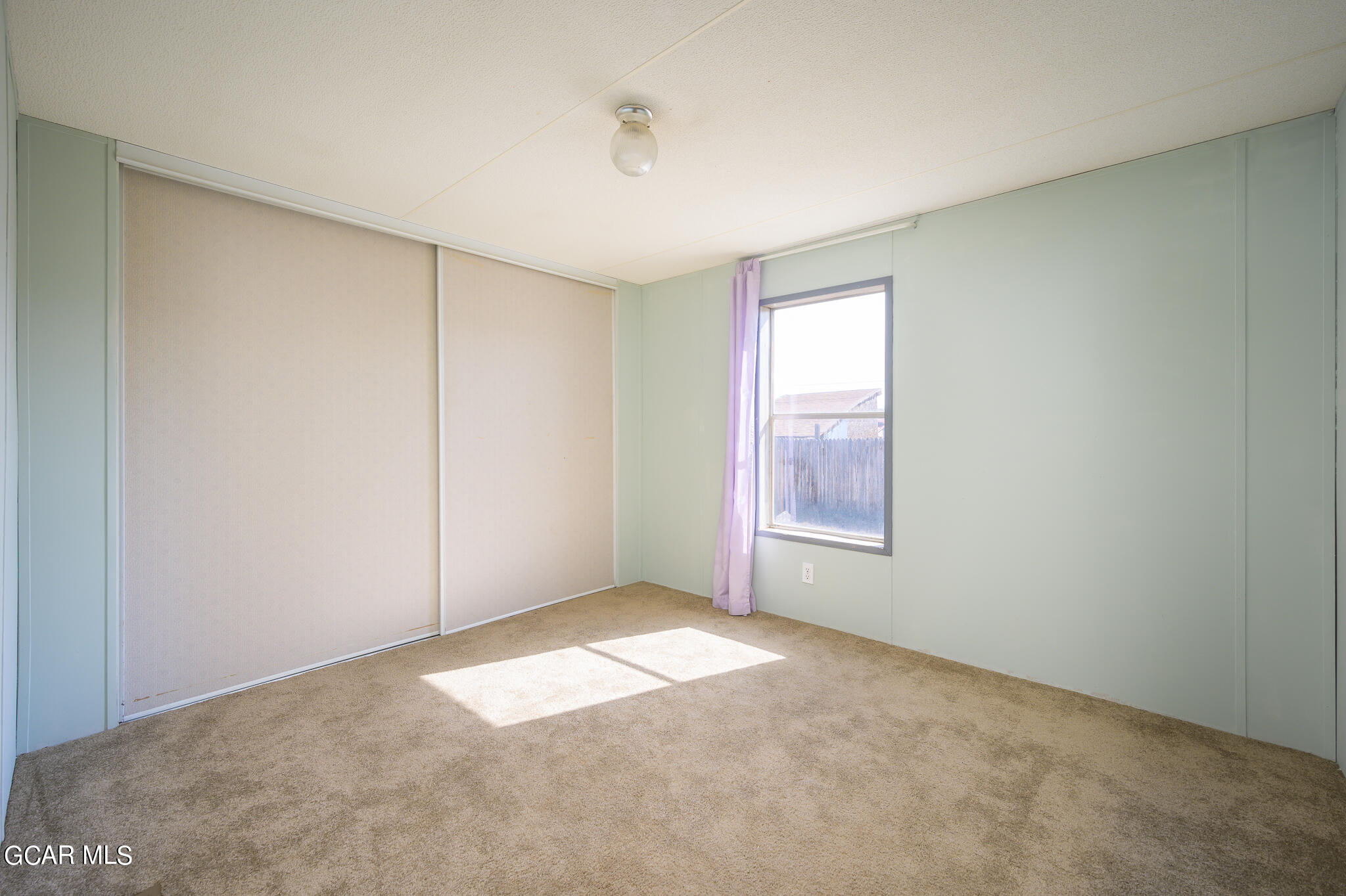 430 Casa Drive Granby, CO 80446 - Photo 21 of 37 a view of an empty room with a window
