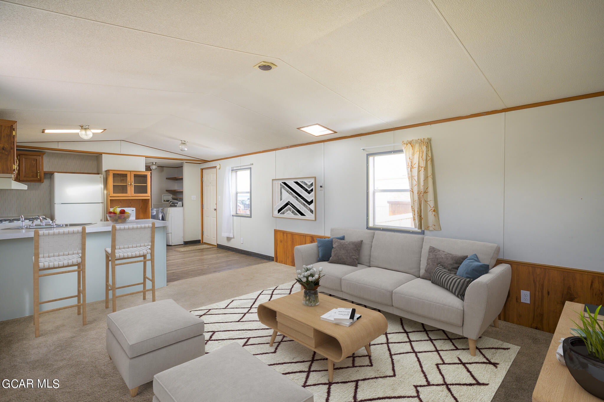 430 Casa Drive Granby, CO 80446 - Photo 3 of 37 a living room with furniture and kitchen view