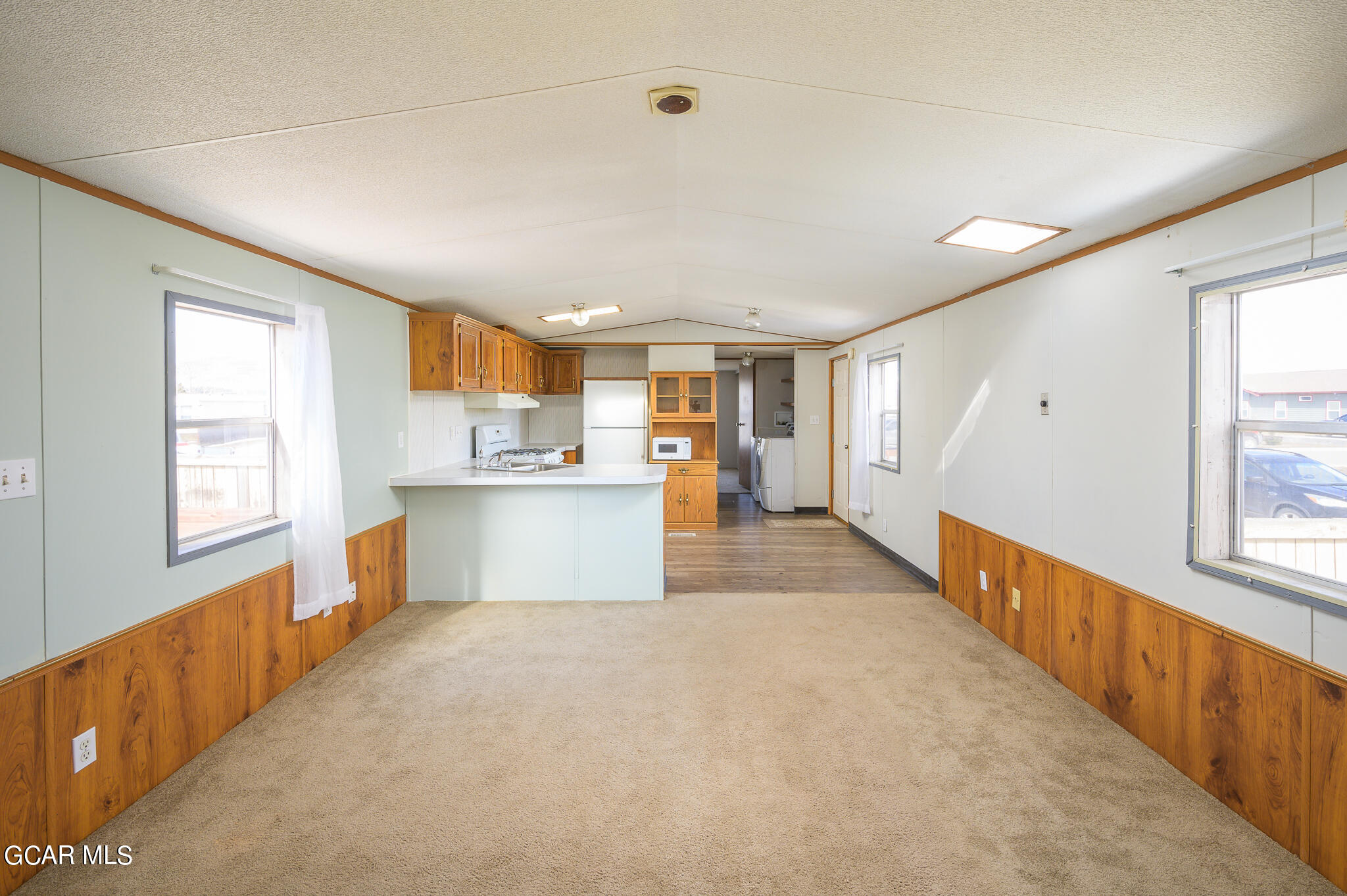 430 Casa Drive Granby, CO 80446 - Photo 6 of 37 a view of a kitchen with a sink and cabinets