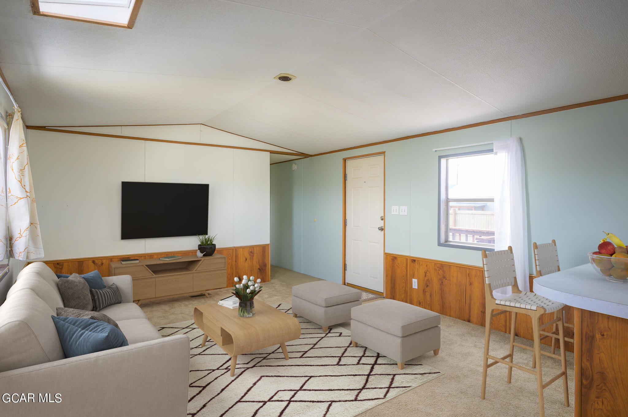430 Casa Drive Granby, CO 80446 - Photo 7 of 37 a living room with furniture and a flat screen tv