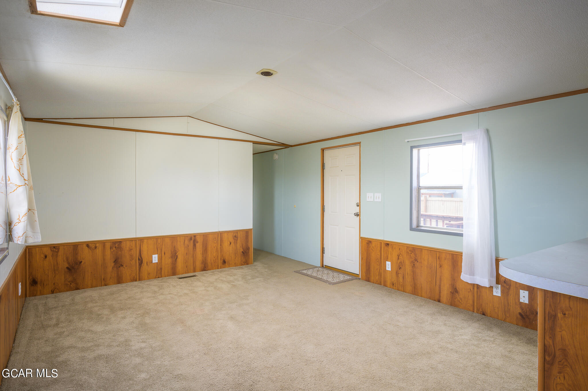 430 Casa Drive Granby, CO 80446 - Photo 8 of 37 a view of an empty room with a window