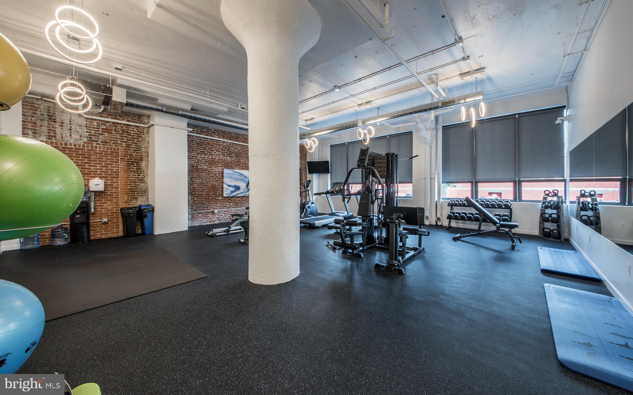 1201 Jackson Street, Unit 5310 Philadelphia, PA 19148 - Photo 20 of 42 a view of a room with gym equipment
