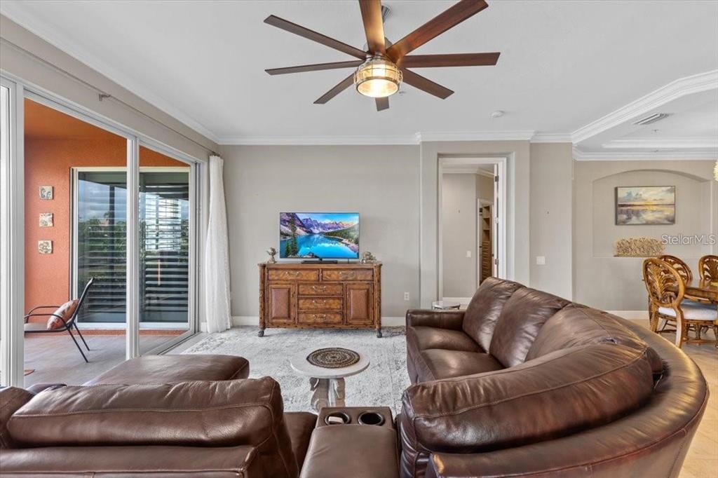 1143 Riverscape Street, Unit A Bradenton, FL 34208 - Photo 19 of 53 a living room with furniture and a large window