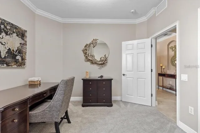 a spacious bathroom with a mirror and a sink