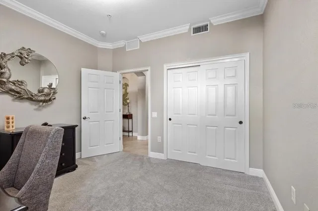 a bathroom with a granite countertop sink toilet and mirror