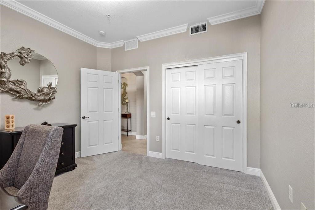 1143 Riverscape Street, Unit A Bradenton, FL 34208 - Photo 34 of 53 a view of room with furniture and closet