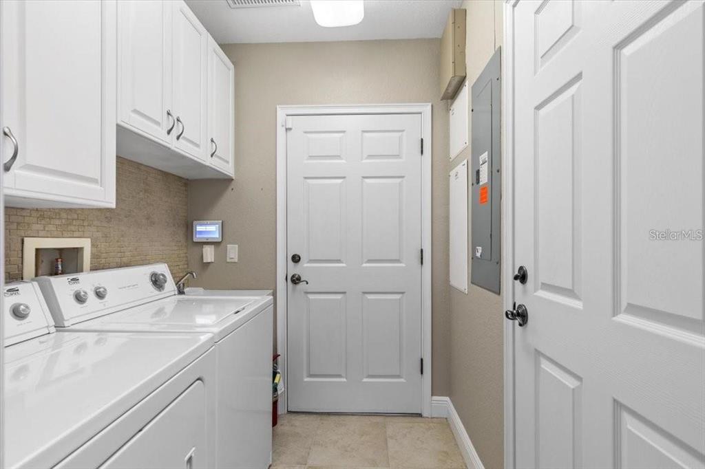 1143 Riverscape Street, Unit A Bradenton, FL 34208 - Photo 36 of 53 a utility room with dryer and washer