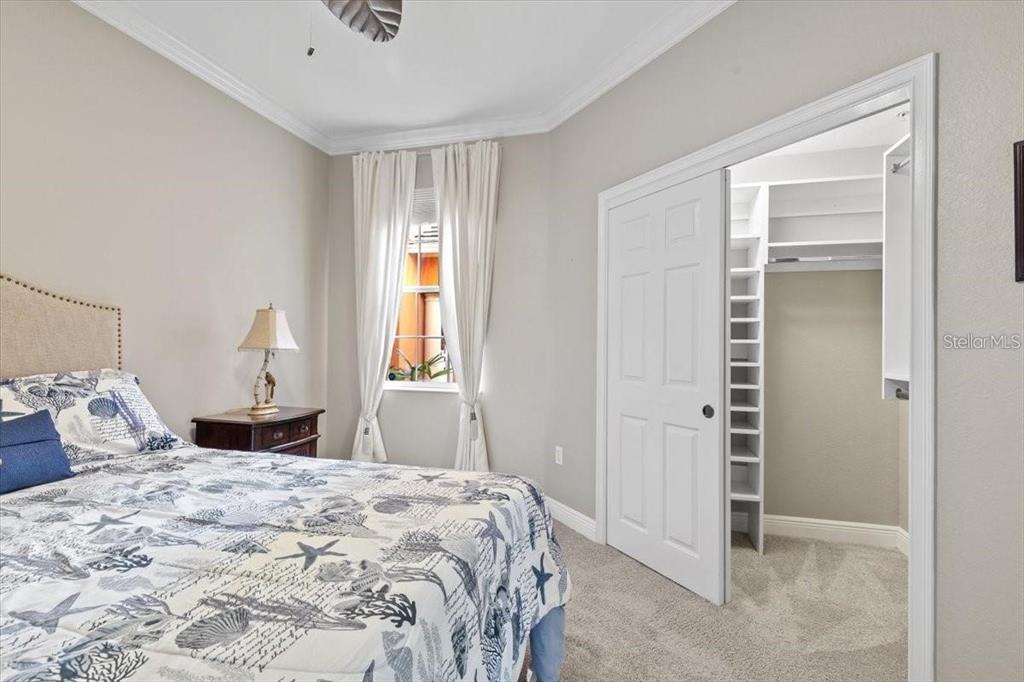 1143 Riverscape Street, Unit A Bradenton, FL 34208 - Photo 41 of 53 a bedroom with a bed and a window