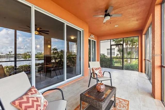 an aerial view of a house with a lake view