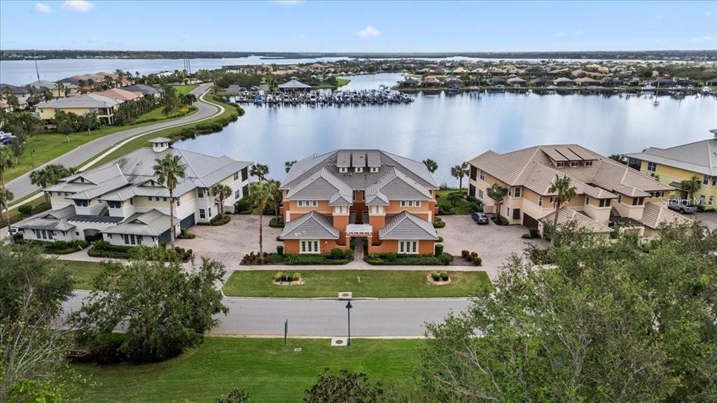 1143 Riverscape Street, Unit A Bradenton, FL 34208 - Photo 47 of 53 an aerial view of a house with a lake view