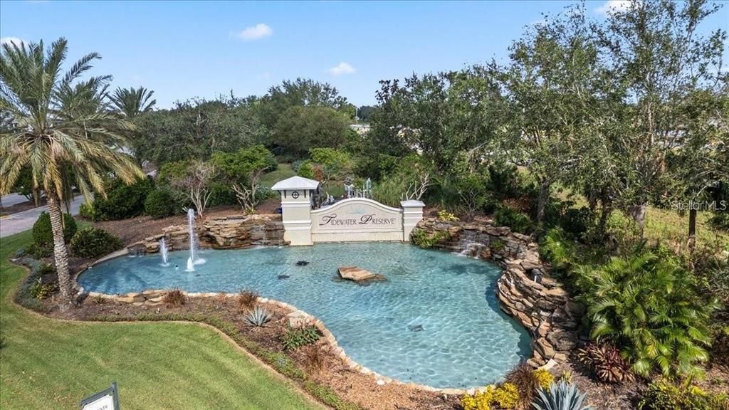 1143 Riverscape Street, Unit A Bradenton, FL 34208 - Photo 50 of 53 a view of a house with a yard