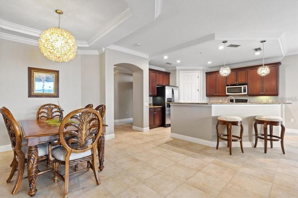 1143 Riverscape Street, Unit A Bradenton, FL 34208 - Photo 7 of 53 a view of a dining room with furniture