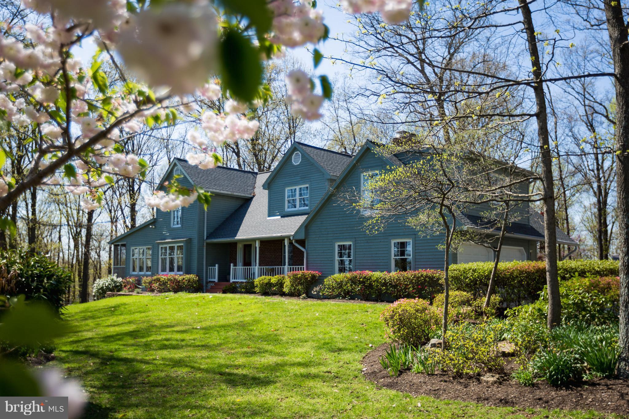 Custom home beautifully landscaped