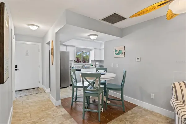 a view of a two chairs in the balcony