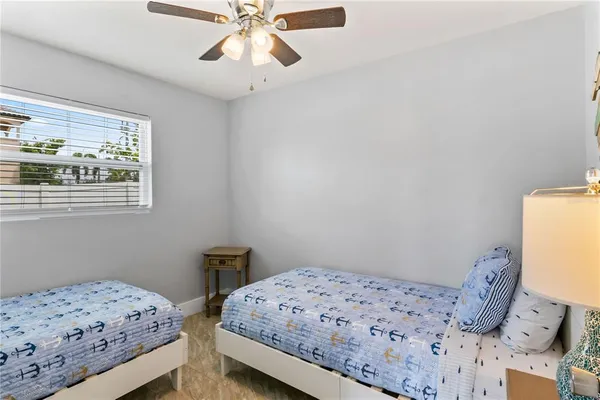 a view of a chair and tables in the balcony