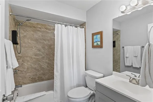 a view of a house with a yard and plants