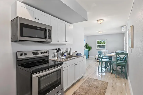 a view of a lake with a building in the background