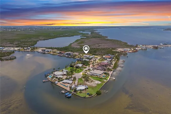 an aerial view of a chairs and table on the terrace