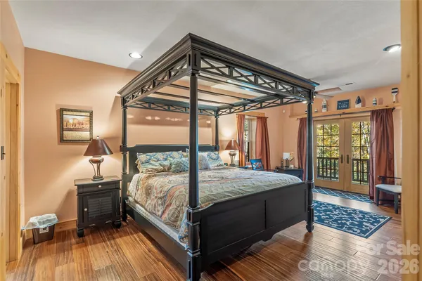 a living room with fireplace furniture and a flat screen tv